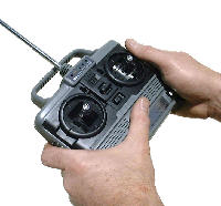 Radio Control transmitter directs the MAD ROBOT's actions