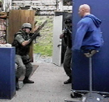 SWAT members encounter MAD ROBOT in shoot house